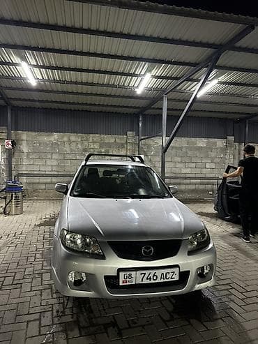 кондидер: Mazda 323: 2002 г., 2 л, Механика, Бензин, Хэтчбэк — 1
