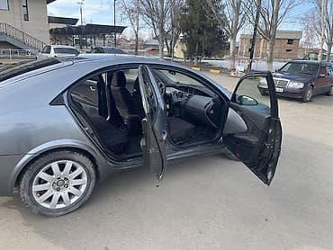 bmb e34: Nissan Primera: 2002 г., Бензин, Седан — 6