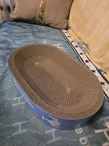 Она выполнена из плотно свернутого гофрированного картона, уложенного — 4