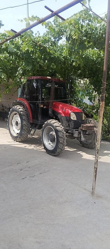 германский комбайн: Трактор Jinma LX704, колесная формула 4х4, с закрытой кабиной — 1