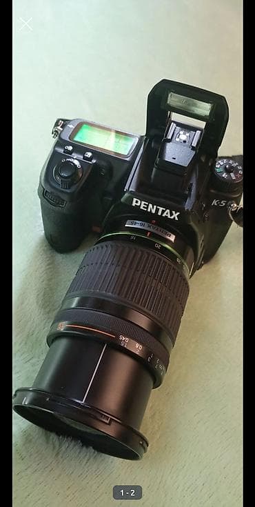 Фотоаппараты: Зеркальная камера Pentax K-5 с универсальным зум-объективом Pentax DA — 1
