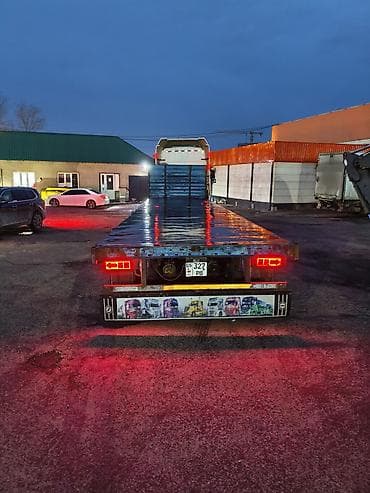 тягач шакман: Услуга грузоперевозок на авто‑транспортe дальнего следования. - — 7