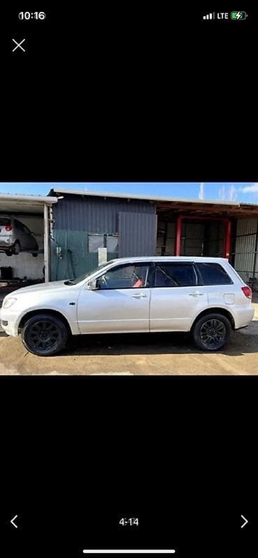 lancer evolution: Mitsubishi Airtrek: 2001 г., 2.4 л, Автомат, Бензин, Кроссовер — 3
