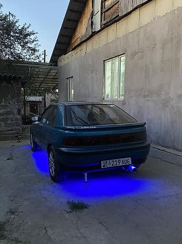 2107 газ: Mazda 323: 1992 г., 1.6 л, Механика, Бензин, Хетчбек — 10