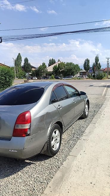 Nissan Primera: 2002 г., Седан — 3