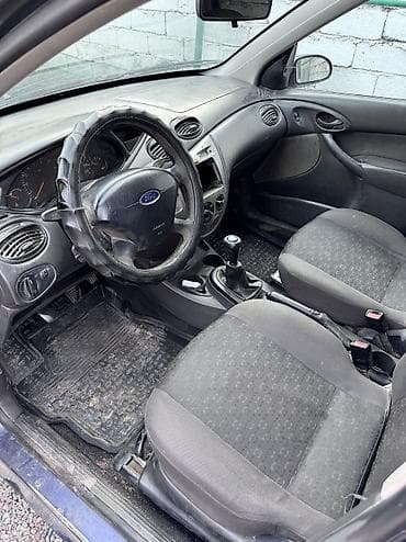 volkswagen 3: Ford Focus: 2003 г. — 4