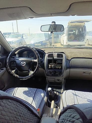 выбор номера о: Mazda 323: 2002 г., Механика, Бензин, Универсал — 5