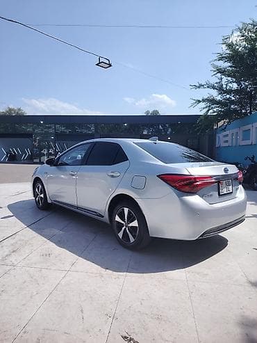 e2 byd: Toyota Corolla: 2020 г., 1.8 л, Вариатор, Гибрид, Седан — 1