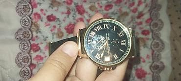 золот: Часы наручные Ulysse Nardin (стиль Marine) - Классический круглый — 1