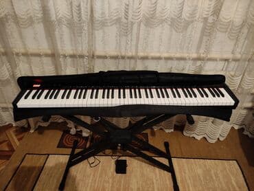Музыкальные инструменты: Электронный цифровое пианино новый 15000 сом. Основные свойства — 5