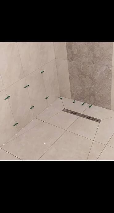 кафель керомагранит: Укладка крупноформатного керамогранита и устройство душевых зон Что — 9