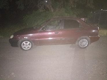 Унаа: Daewoo Lanos: 1999 г., Кол менен иштөөчү, Бензин, Седан — 1
