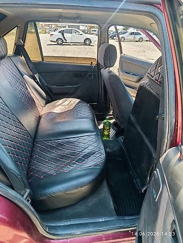 левый: Daewoo Nexia: 2011 г., 1.5 л, Механика, Бензин, Седан — 6
