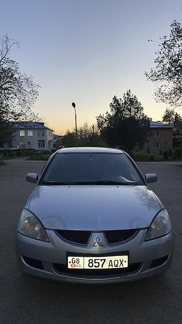 выхлоп бмв е34: Mitsubishi Lancer: 2005 г., Ручные, Бензин, Седан — 5