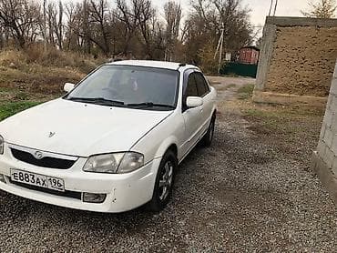 daf 75: Mazda 323: 1999 г., 1.9 л, Автомат, Дизель, Седан — 4