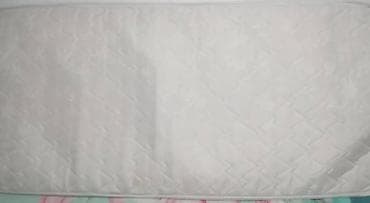 Матрас бир кишилик Наматрасник белого цвета с рельефной поверхностью