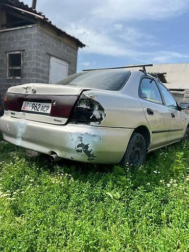 купить гоночную машину: Mazda Familia: 1996 г., Механика, Бензин, Седан — 3