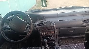 авто насос: Mazda 626: 1996 г., 1.8 л, Механика, Бензин, Лифтбек — 5