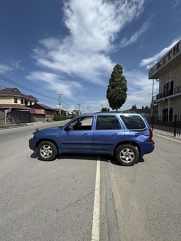 step 2: Mazda Tribute: 2003 г., 2 л, Автомат, Газ, Кроссовер — 4