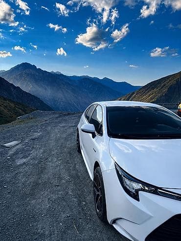 byd e2 2019: Toyota Corolla: 2023 г., 1.8 л, Вариатор, Гибрид, Седан — 5