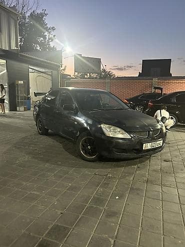Транспорт: Mitsubishi Lancer: 2005 г., 1.6 л, Автомат, Бензин, Седан — 1