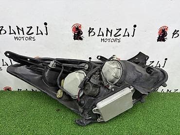 Передняя левая фара Toyota 2005 г., Б/у, Оригинал, Япония — 6