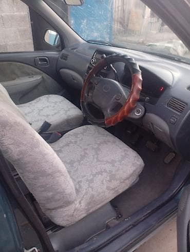 топливный бак: Toyota Raum: 1997 г., 1.5 л, Автомат, Бензин, Хэтчбэк — 1