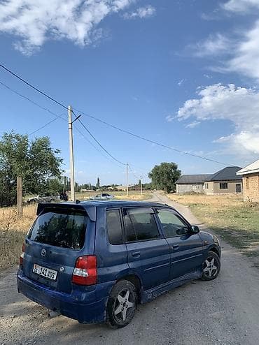 Унаа: Mazda Demio: 2002 г., 1.3 л, Кол менен иштөөчү, Бензин, Хетчбек — 6
