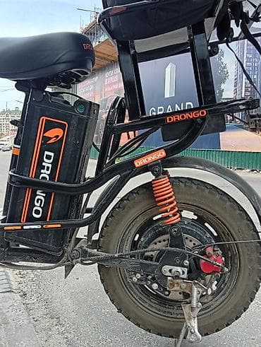 дрон грузовой: Электроскутер DRONGO с грузовой корзиной и задней платформой — 2