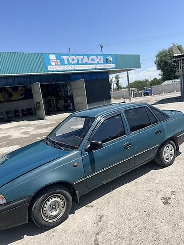 2 4 д: Daewoo Nexia: 2003 г., Механика, Бензин, Седан — 9
