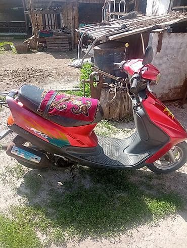 Мотоуслуги: Скутер Yamaha Jog, красный цвет. красный Основные характеристики:таза — 4