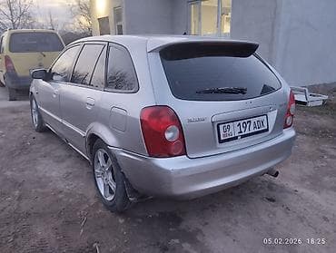 forester 2003: Mazda 323: 2003 г., 1.6 л, Механика, Бензин, Хэтчбэк — 6