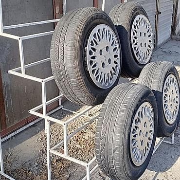 diska 13: Предлагаю 1. комплект летней резины на дисках размером 185\70-R-14 — 2