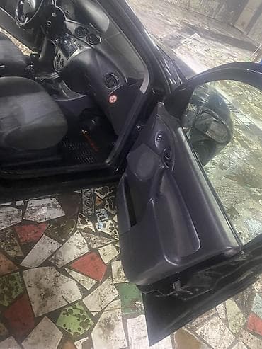 Ford Focus: 2002 г., 1.8 л, Механика, Дизель, Универсал — 9