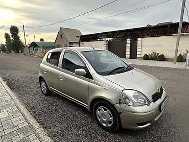 byd e7: Toyota Yaris: 2002 г., Автомат, Бензин, Хэтчбэк — 5