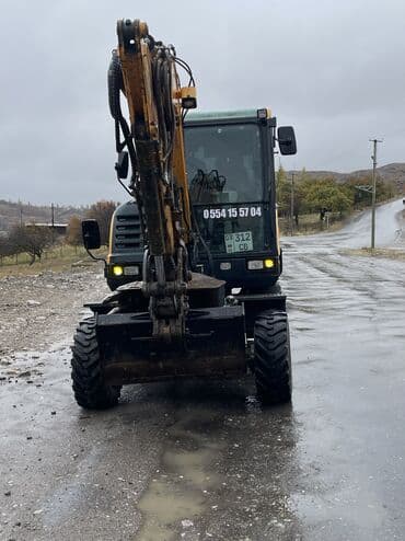авто зарядное устройство для автомобильного аккумулятора: Экскаватор, Hyundai, 2017 г., Колесный — 1