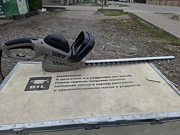 секатор: Электрический кусторез Ураган PROtech - Мощность: 900 Вт (указано на — 4