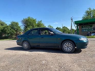 Mazda 626: 1999 г., 1.8 л, Механика, Бензин, Седан