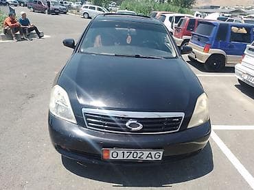 corolla s: Nissan Teana I (J31), черный седан бизнес-класса. Основные — 4