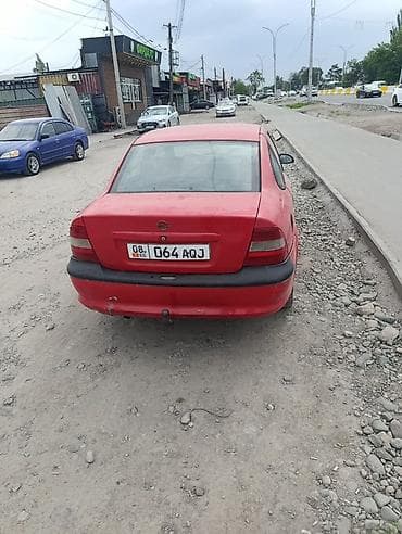 5: Opel Astra: 1996 г., Седан — 3