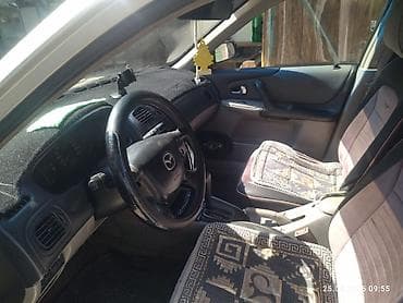 xc 90: Mazda 323: 2002 г., 1.6 л, Автомат, Бензин, Хэтчбэк — 6