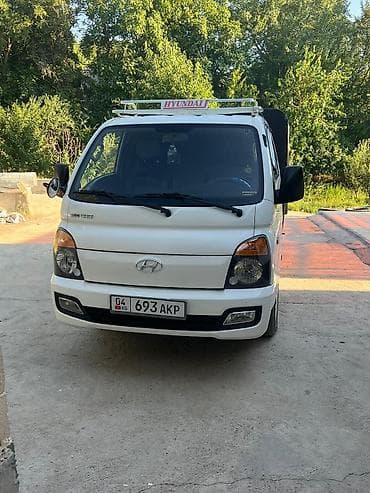 Hyundai Porter II бортовой грузовик с тентом - Двигатель CRDi, 126