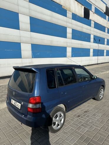 крыло нексия 1: Mazda Demio: 2001 г., 1.3 л, Автомат, Бензиновая, Хэтчбэк — 2