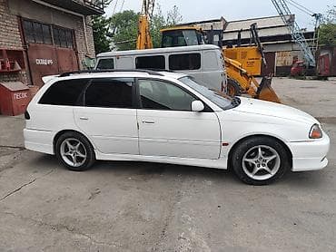 corolla e150: Универсал белого цвета, правый руль. Просторный кузов с большим — 7