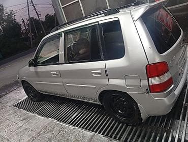 Mazda Demio: 1997 г., 1.5 л, Механика, Газ, Универсал — 2