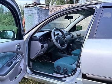 wuling mini ev: Nissan Almera: 2002 г., 1.8 л, Механика, Бензин, Хэтчбэк — 6