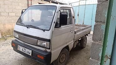 бутка бишкек: Компактный бортовой мини‑грузовик (кабина над мотором), двухместная — 2
