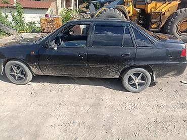нива chevrolet: Daewoo Nexia: 2010 г., Механика, Седан — 2