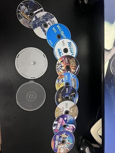 switch nintendo: Nintendo Wii (черная версия) с комплектом аксессуаров и подборкой игр — 1