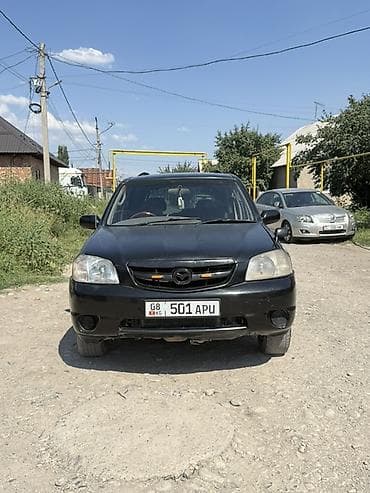 форестер 2001: Mazda Tribute: 2001 г., 2 л, Автомат, Бензин, Кроссовер — 1